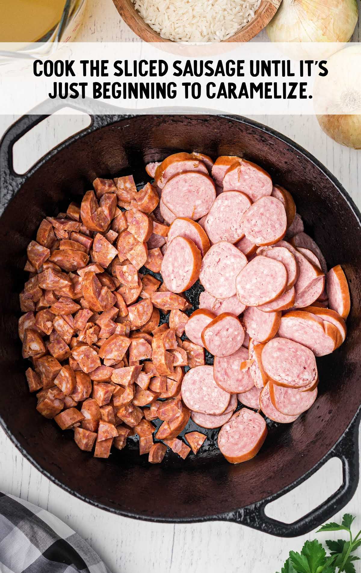 sausage being cooked in a pot