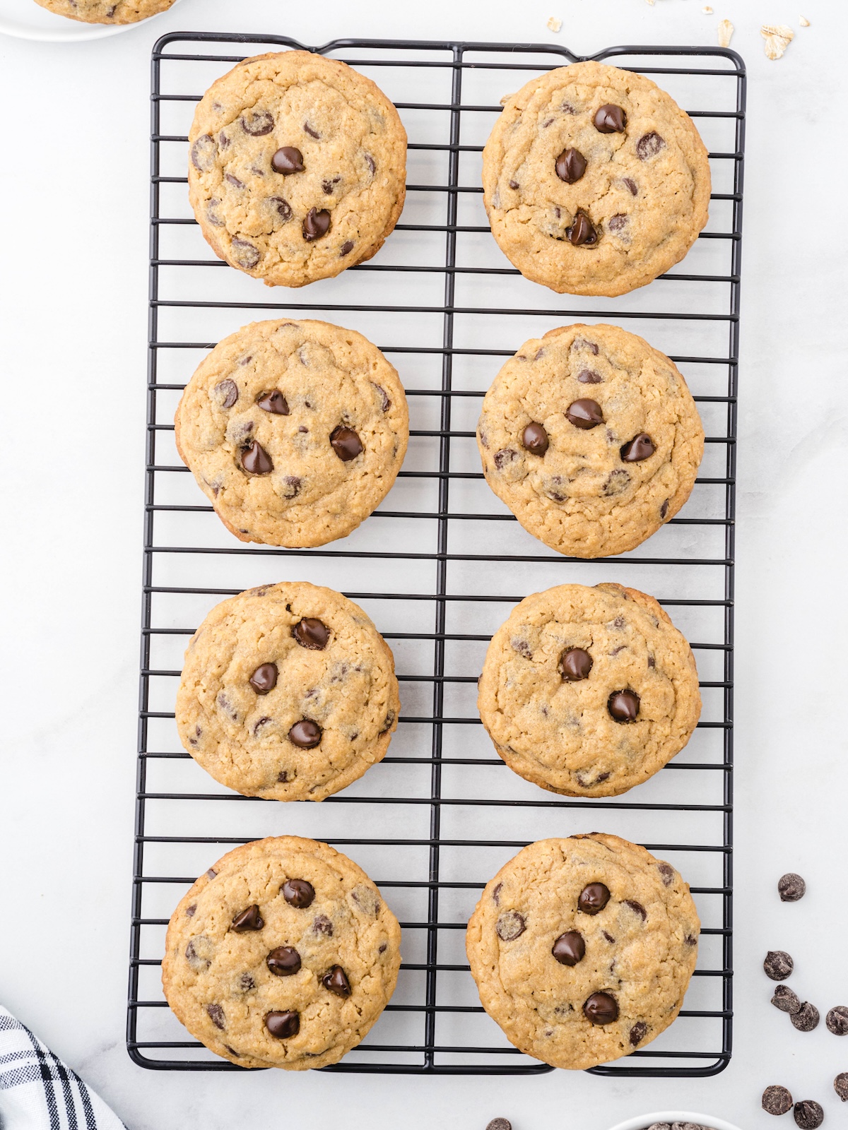 peanut butter oatmeal chocolate chip cookies on a cooling rack