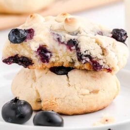close up shot of Blueberry Cookies on a plate with blueberries