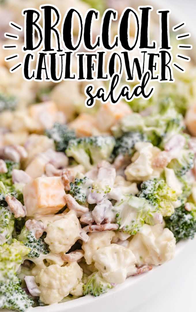 close up shot of broccoli cauliflower salad with homemade salad dressing in a bowl