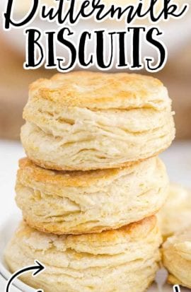 buttermilk biscuits stacked on top of each other on a plate