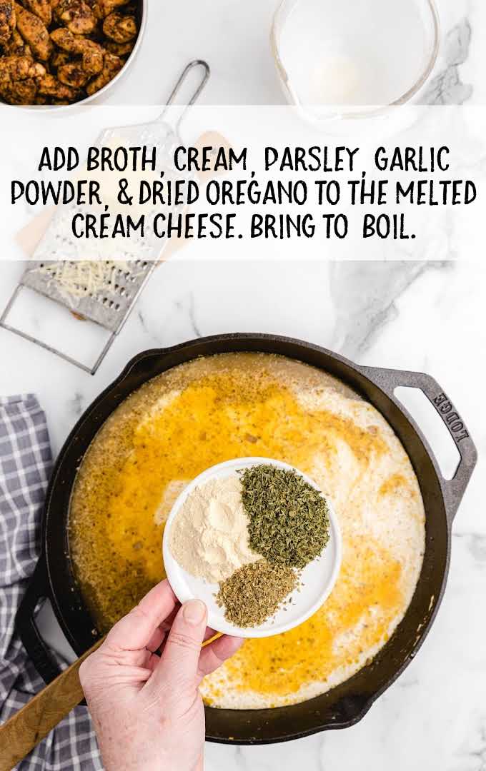 broth, cream, parsley, garlic powder, and oregano added to the melted cream cheese 
