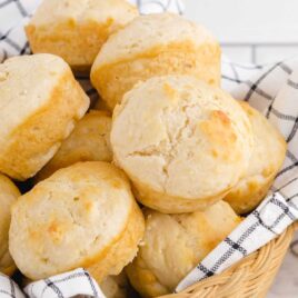 close up shot of a basket of No Yeast Dinner Rolls