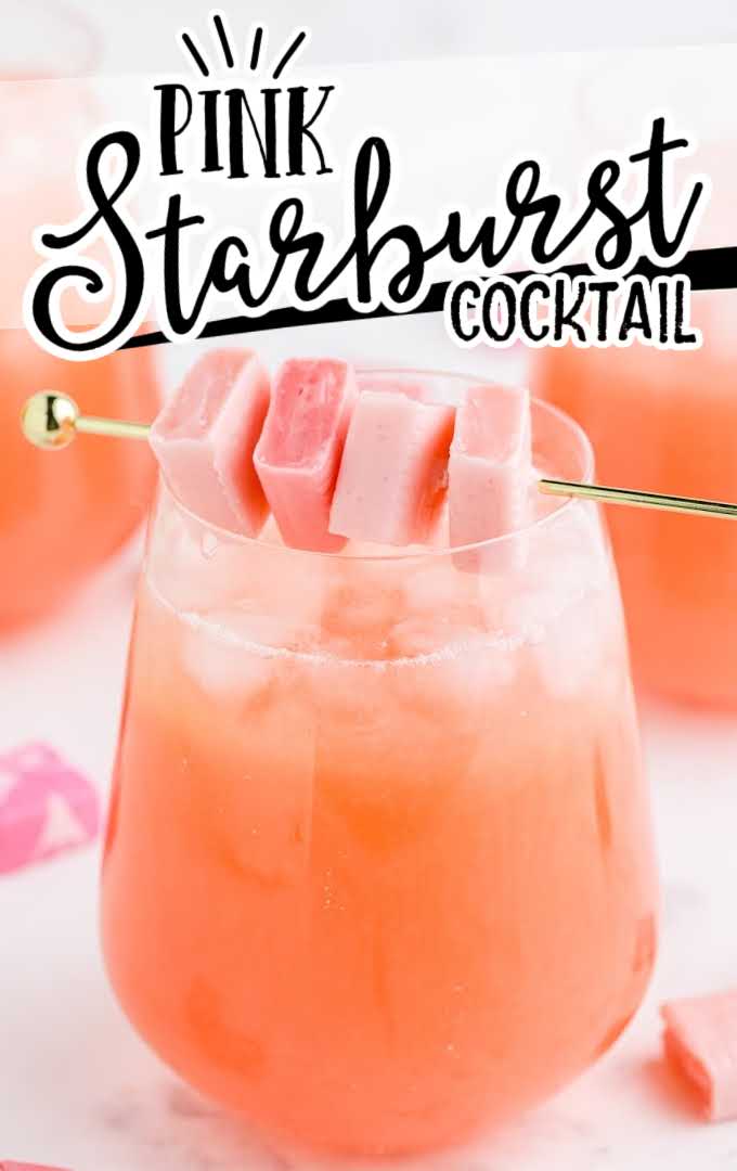 pink starburst cocktail with starburst candy in a glass