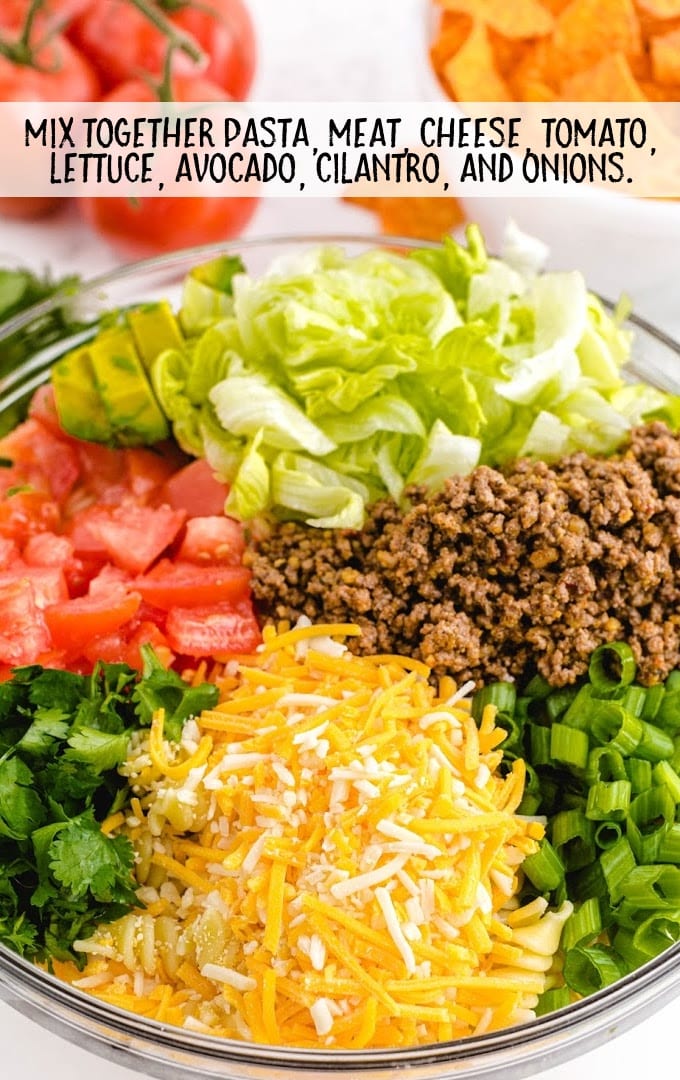 taco pasta salad ingredients in a large bowl