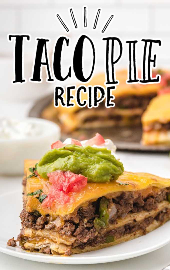 Taco Pie topped with guacamole, cream cheese, and salsa on a plate