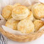 close up shot of buttermilk biscuits in a bread basket
