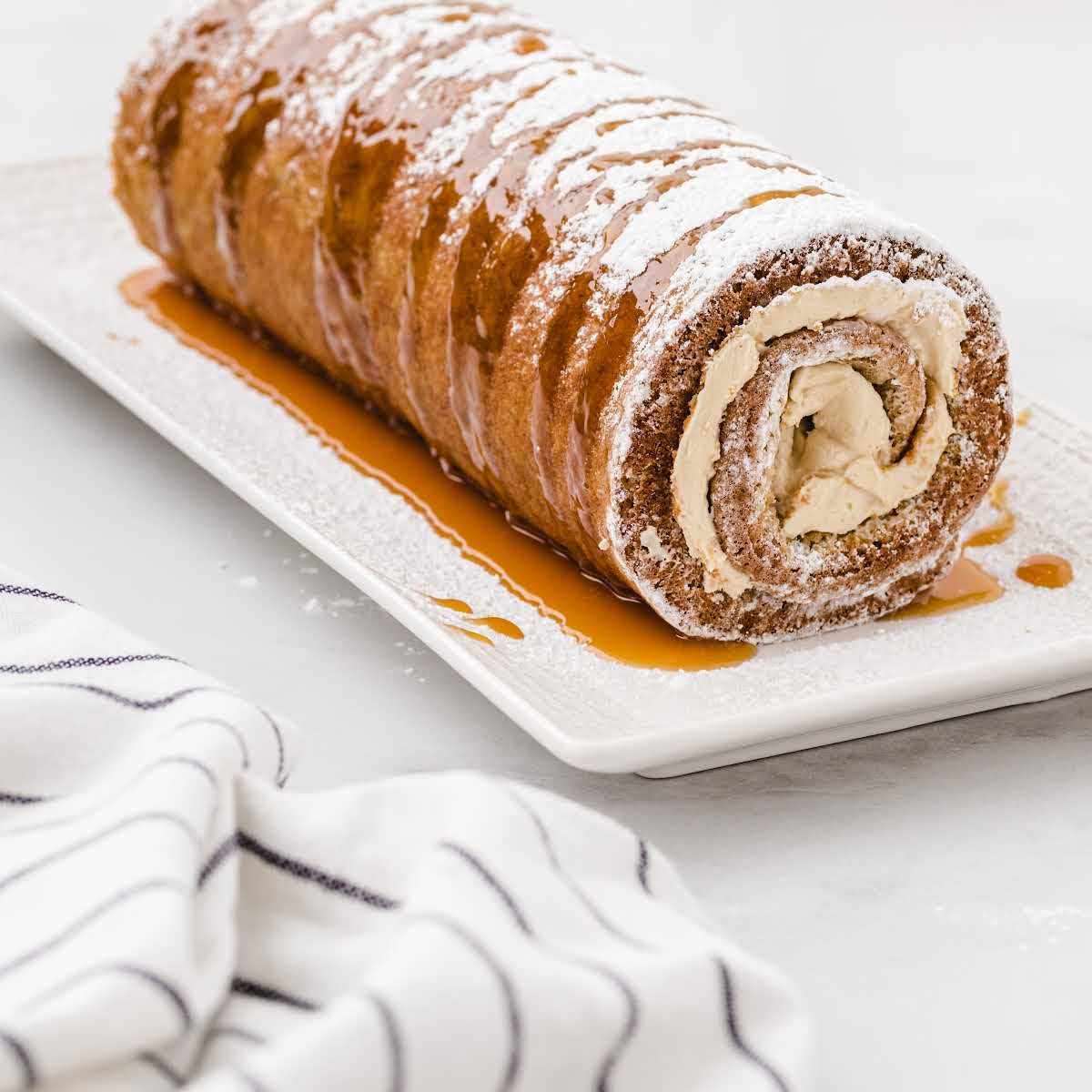 https://spaceshipsandlaserbeams.com/wp-content/uploads/2021/04/Caramel-Banana-Cake-Roll-Recipe-Card-1.jpg