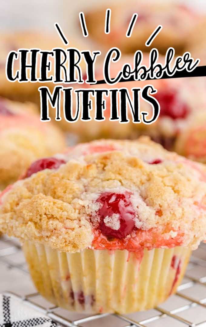 close up shot of cherry cobbler muffins on a cooling rack