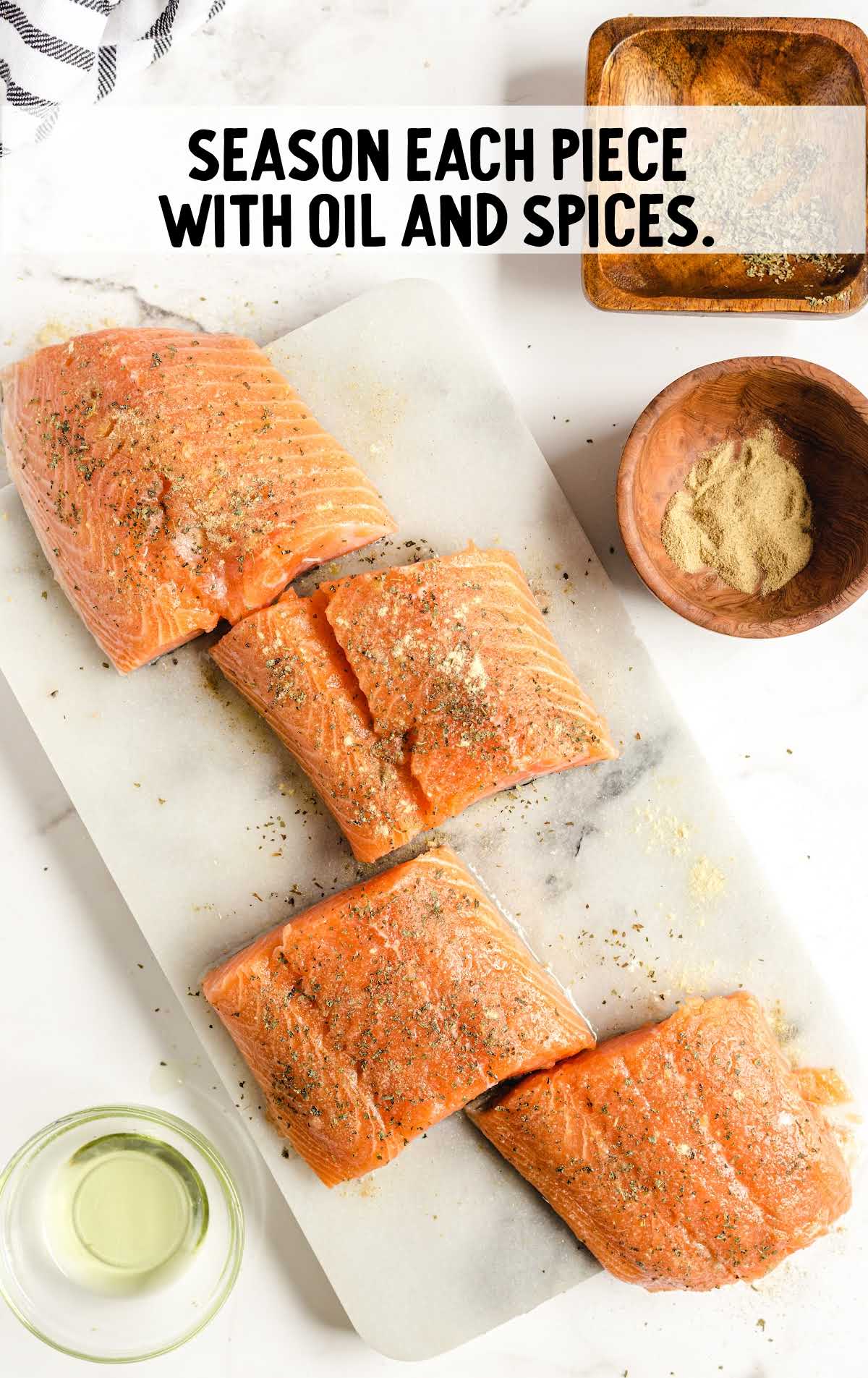 sliced salmon pieces seasoned with oil and spices