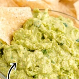 a bowl of guacamole with chips