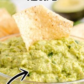 a bowl of guacamole with chips