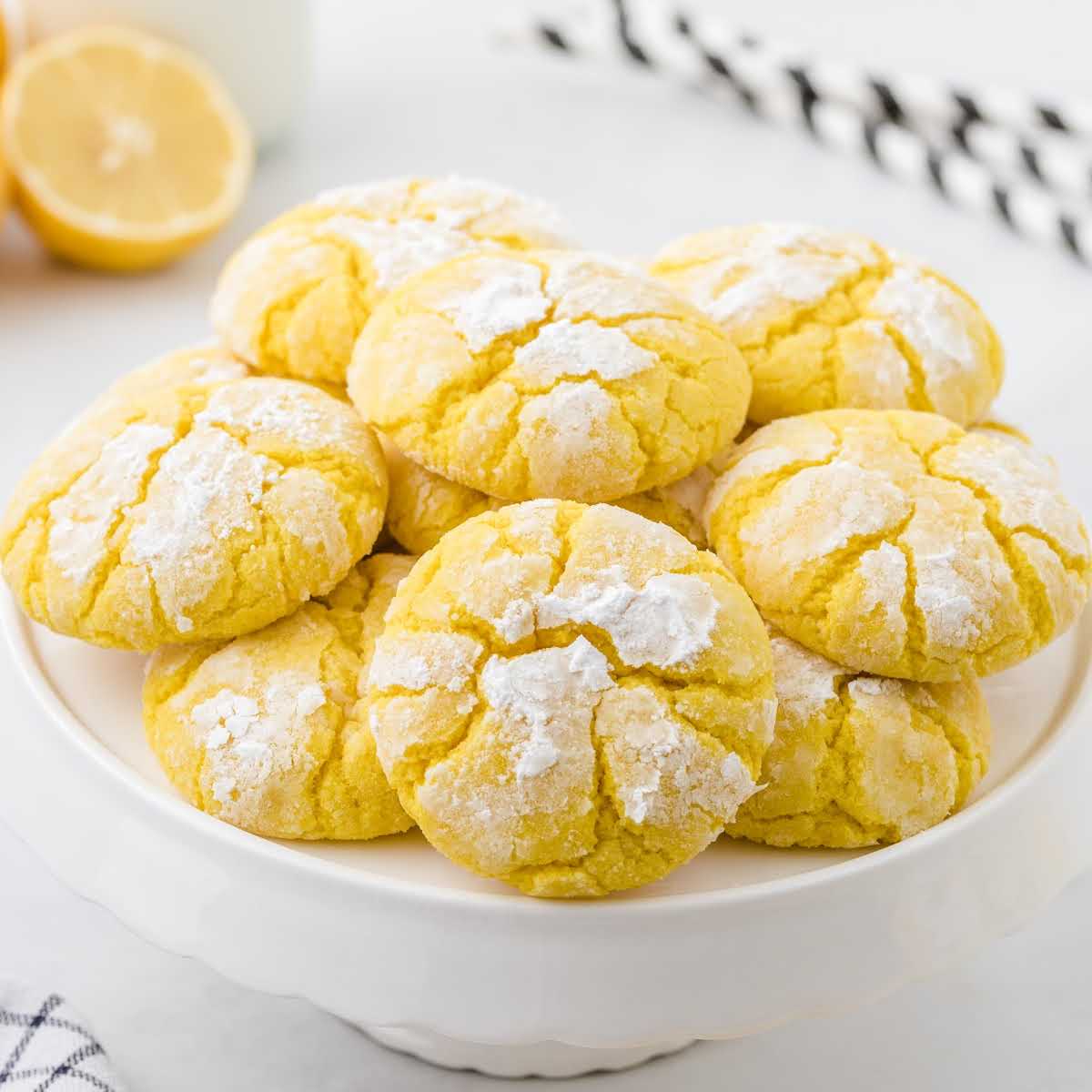 close up shot of lemon crinkle cookies in a bowl