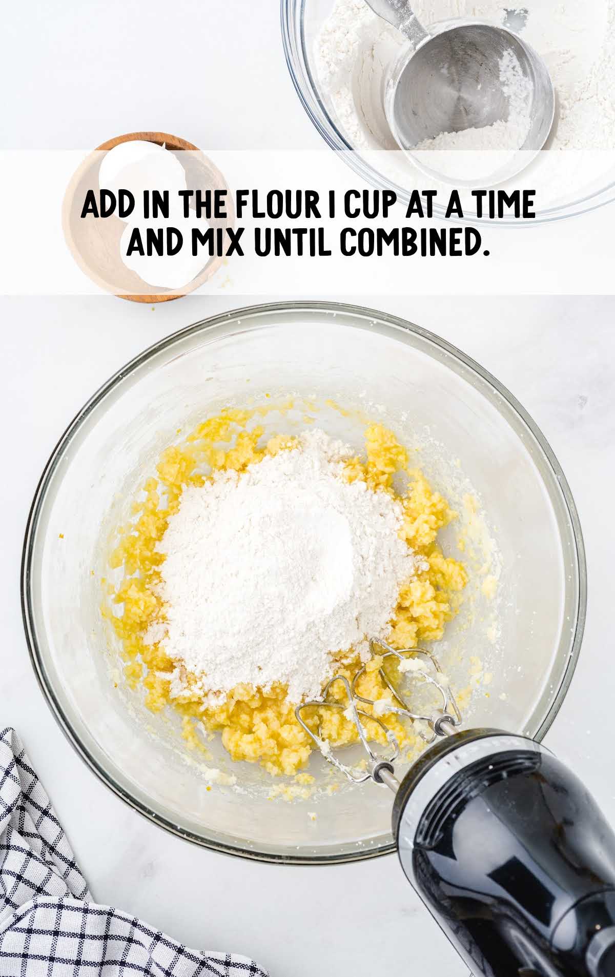flour added to the ingredients in the bowl