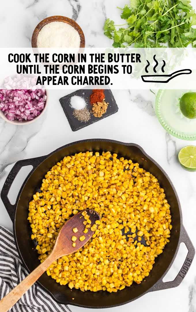 Mexican corn salad process shot of corn being cooked in a skillet