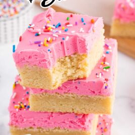 close up shot of Sugar Cookie Bars stacked on top of each other