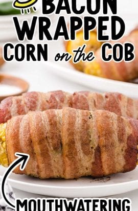 close up shot of bacon-wrapped corn on the cob on a white plate