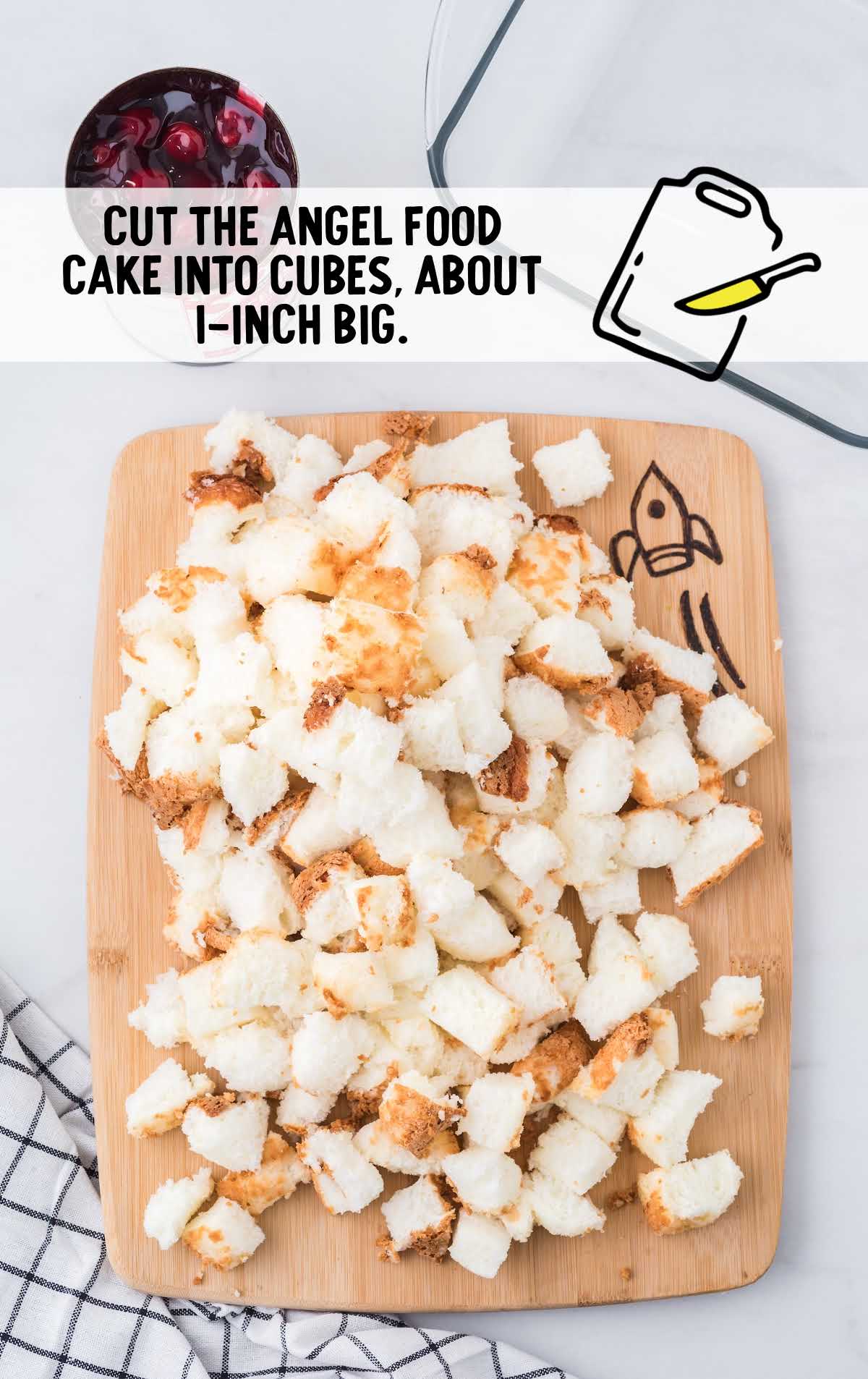 angel food cake cut into cubes on a wooden board