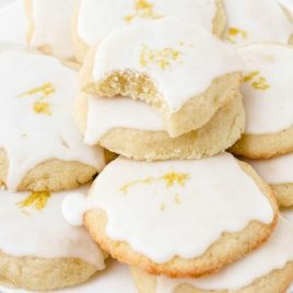 close up shot of lemon meltaway cookies piled on top of each other