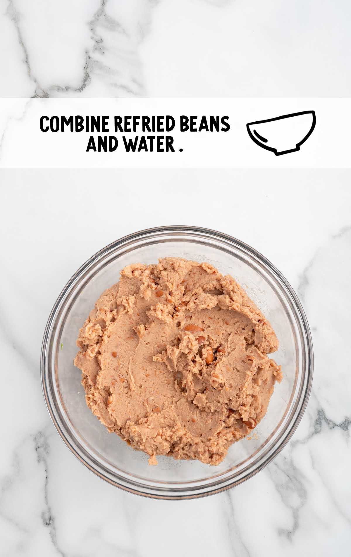 refried beans and water combined in a bowl