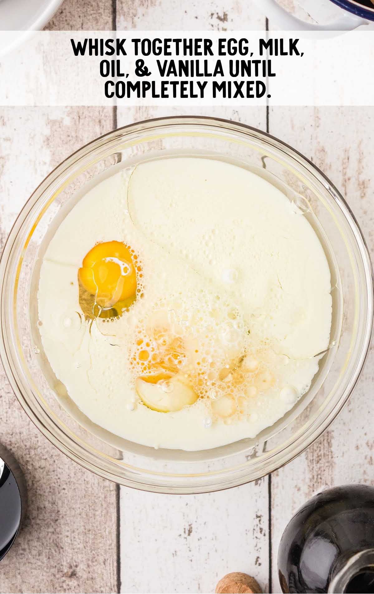 egg, milk, oil, and vanilla whisked together 