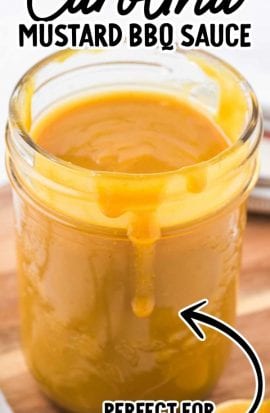 close up shot of Carolina mustard BBQ sauce in a mason jar