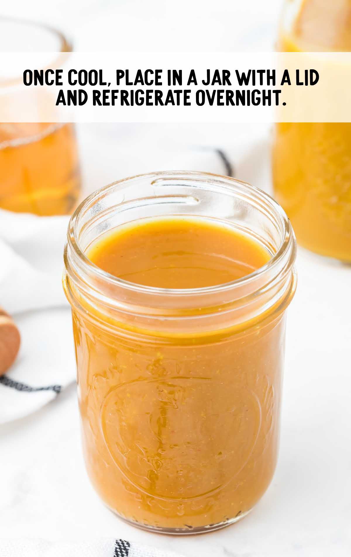 Carolina mustard BBQ sauce process shot of sauce in a mason jar