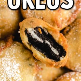 close up shot of deep fried oreos sprinkled with powdered sugar