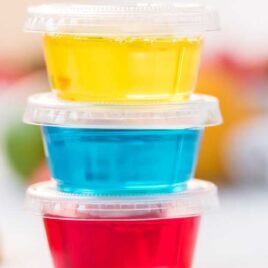 close up shot of plastic containers of Jello Shots stacked on top of each other