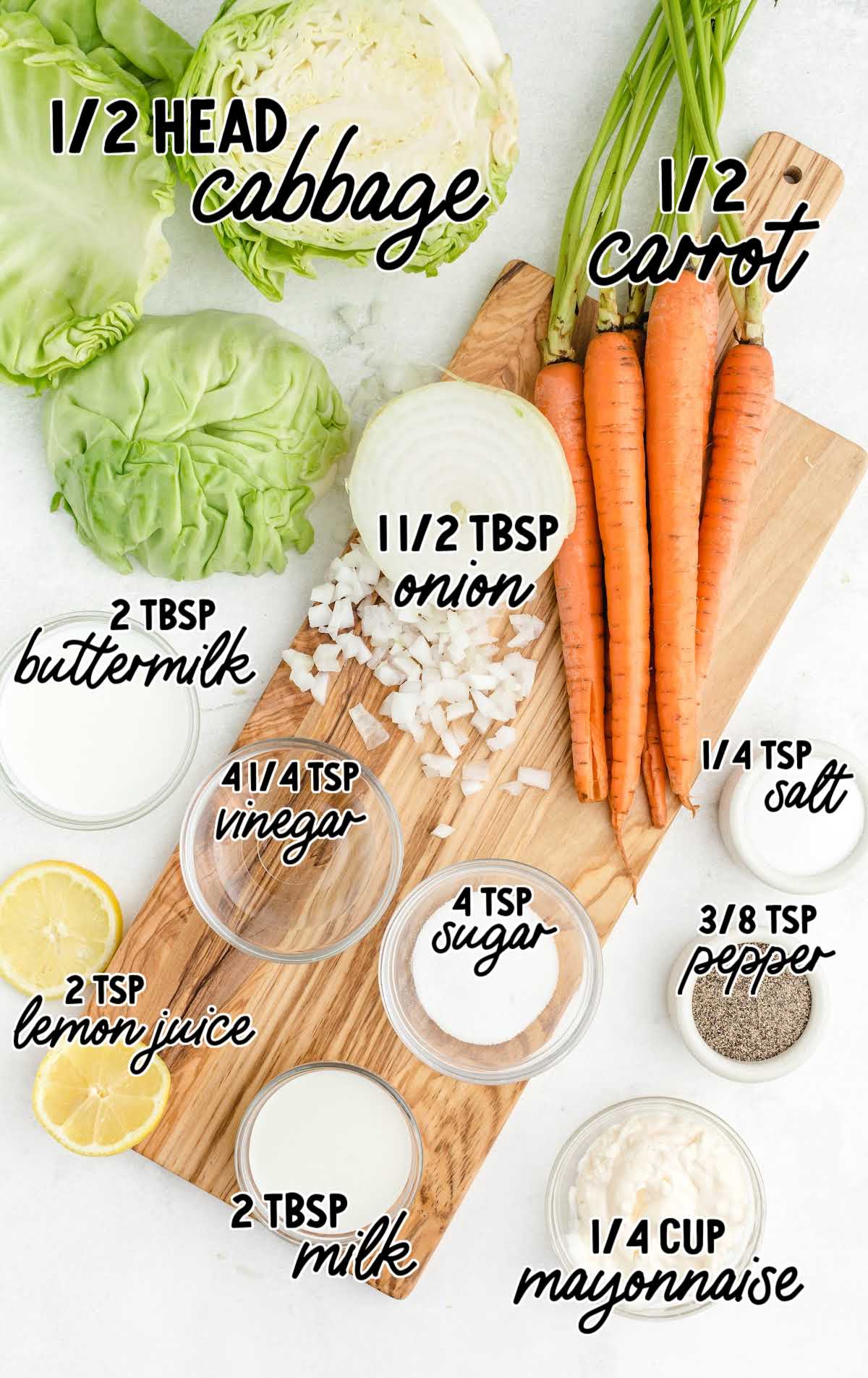 Overhead view of coleslaw ingredients labeled with text, including cabbage, carrots, onion, mayo, and seasonings.