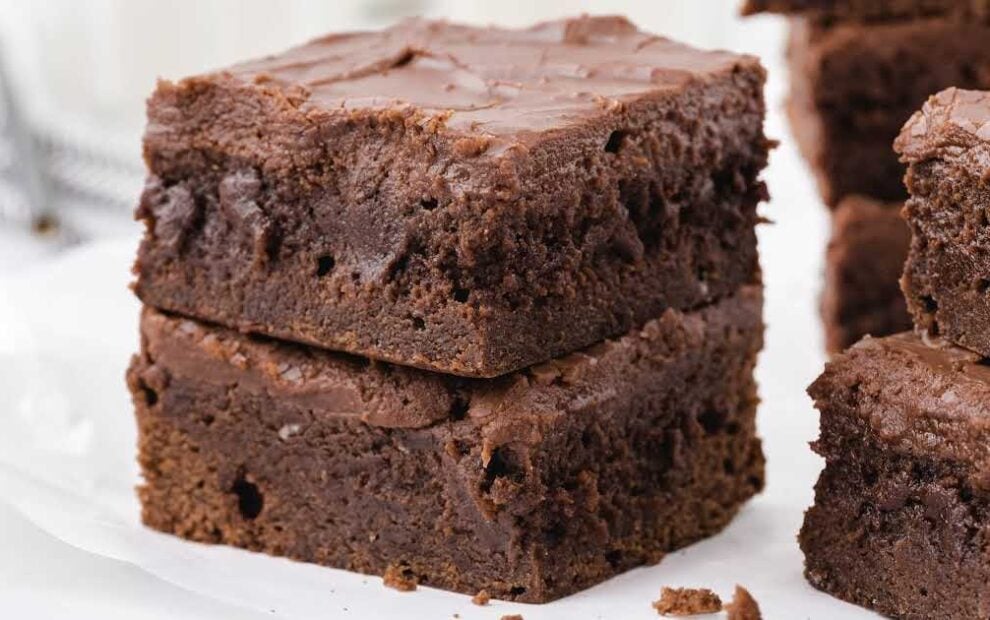 close up shot of Lunch Lady Brownies stacked on top of each other