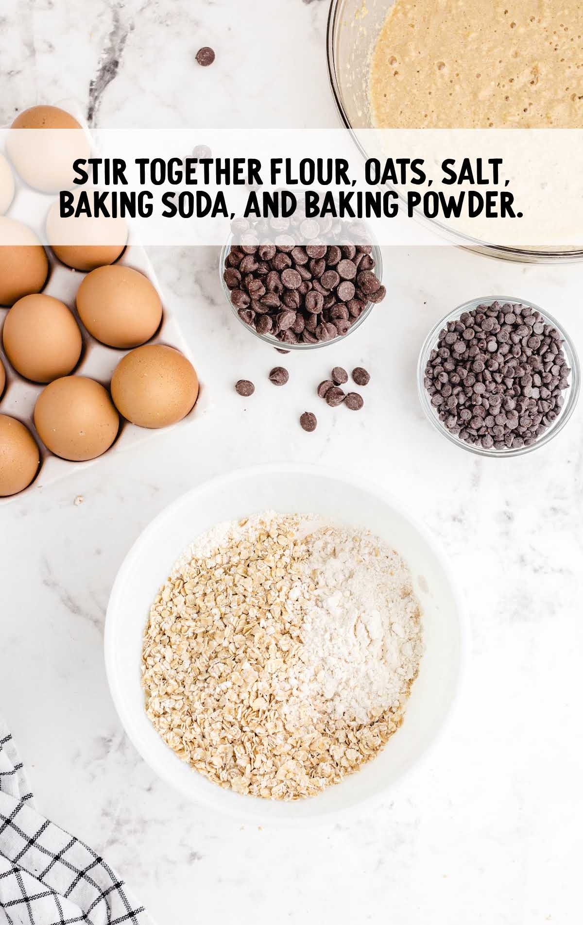 flour, oats, salt, baking soda, and baking powder stirred together