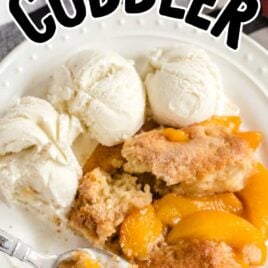 a plate of peach cobbler with vanilla ice cream