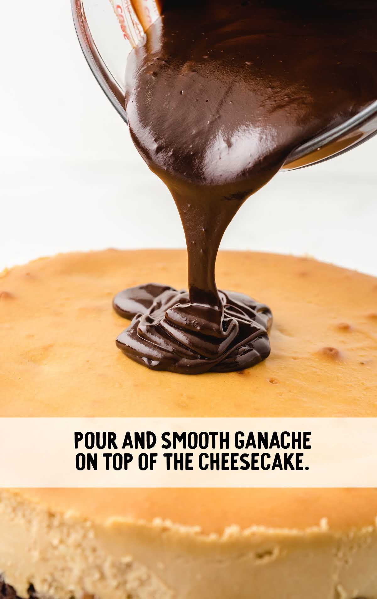 Close-up of rich chocolate ganache being poured onto the top of a baked cheesecake.
