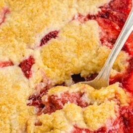 close up shot of Strawberry Cobbler in a baking dish
