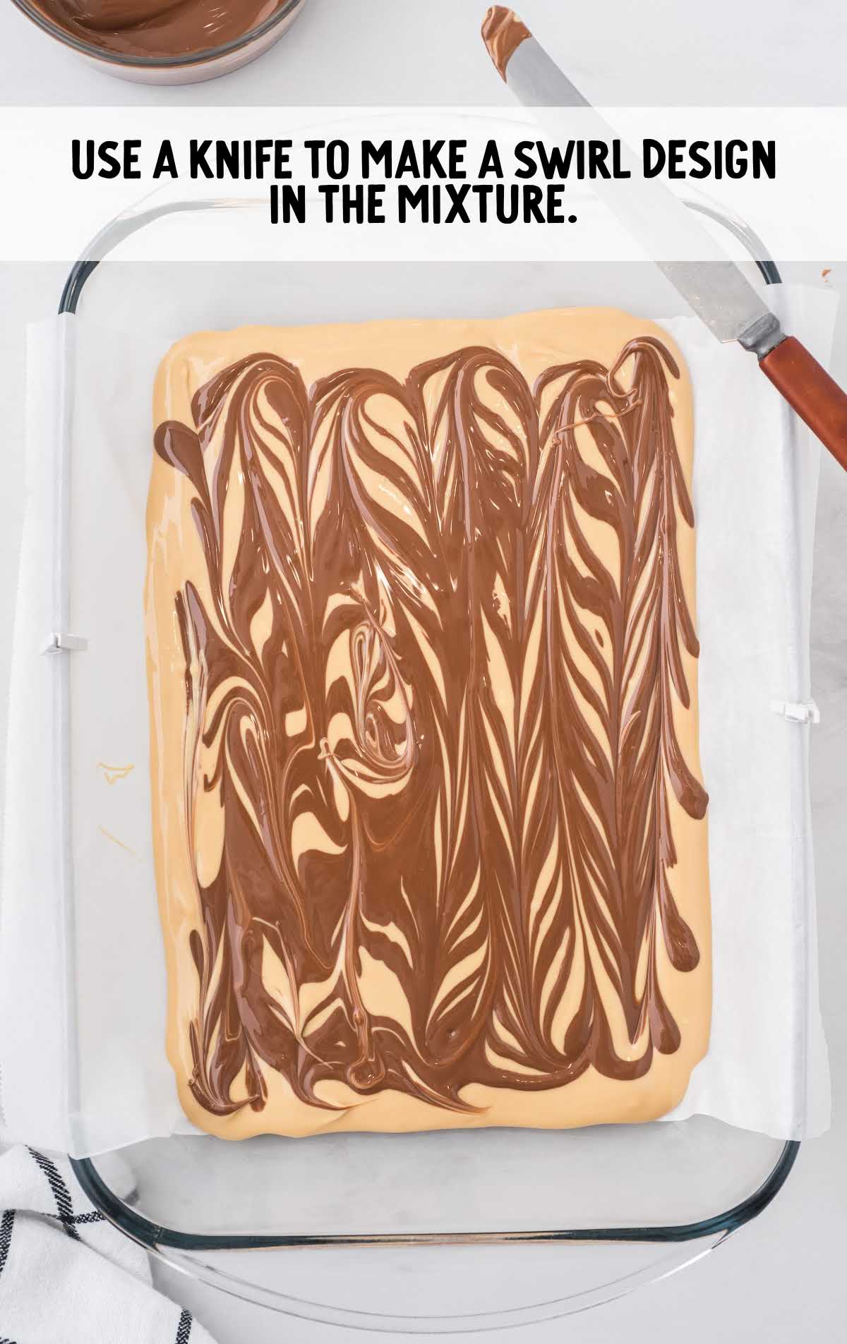 tiger fudge process shot of swirl designs being made on fudge with a knife