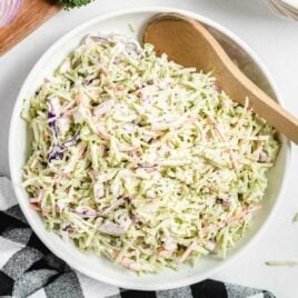 overhead shot Broccoli Slaw in a bowl with a spoon