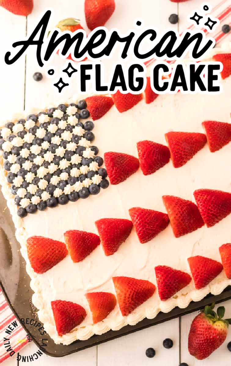 close up shot of American flag cake topped with strawberries and blueberries in a baking dish