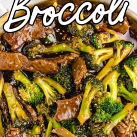 overhead shot of Beef and Broccoli in a baking pan with a wooden spoon