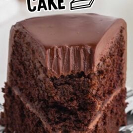 close up shot of a slice of Black Magic Cake on a cake