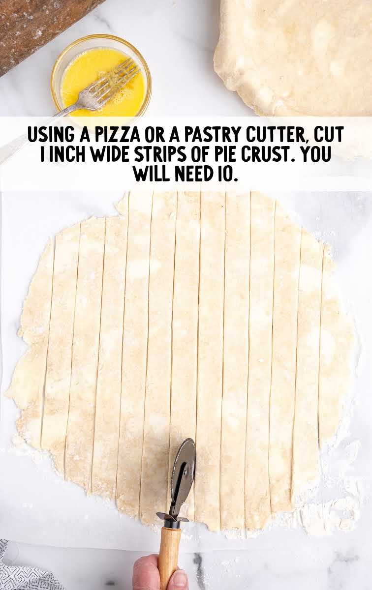 pie crust dough being cut