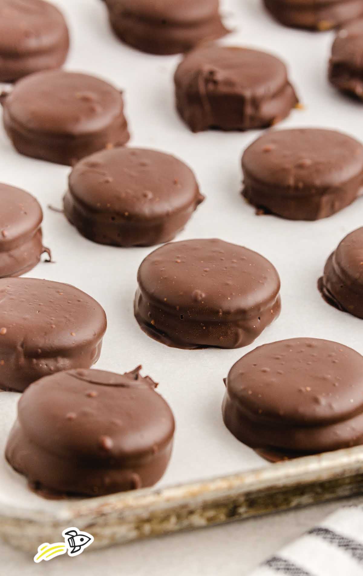 close up shot of Chocolate Peanut Butter Ritz Cookies on a baking sheet