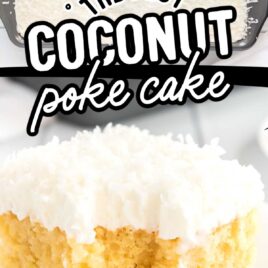 close up shot of coconut poke cake with coconut frosting on a white plate with a piece taken out of it with a fork