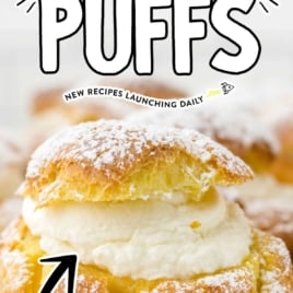 Cream puff on a cooling rack with text overlay reading “The Best Cream Puffs – Easy Homemade Recipe.”