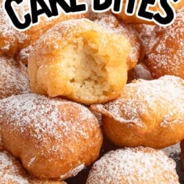 A plate of golden brown Funnel Cake Bites dusted with powdered sugar, with one bite revealing the soft interior. Text reads โFunnel Cake Bites Recipeโ and โVintage Recipe!โ with a playful arrow.