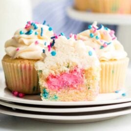 Gender Reveal Cupcakes with sprinkles on a plate