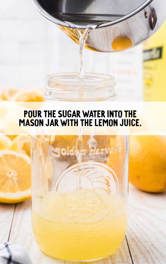 sugar water poured into a jar of lemon juice