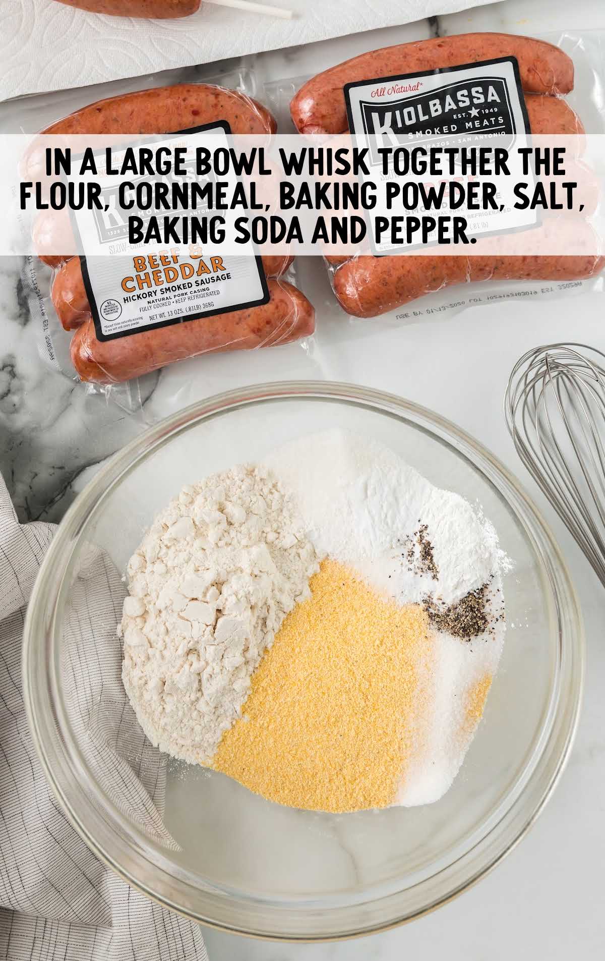 flour, cornmeal, baking powder, salt, baking soda, and pepper combined in a bowl