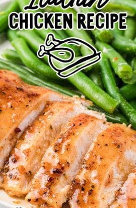 close up shot of Italian chicken sliced on a plate served with a side of green beans