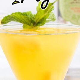 close up shot of Mango Mojito in a glass with mint leave